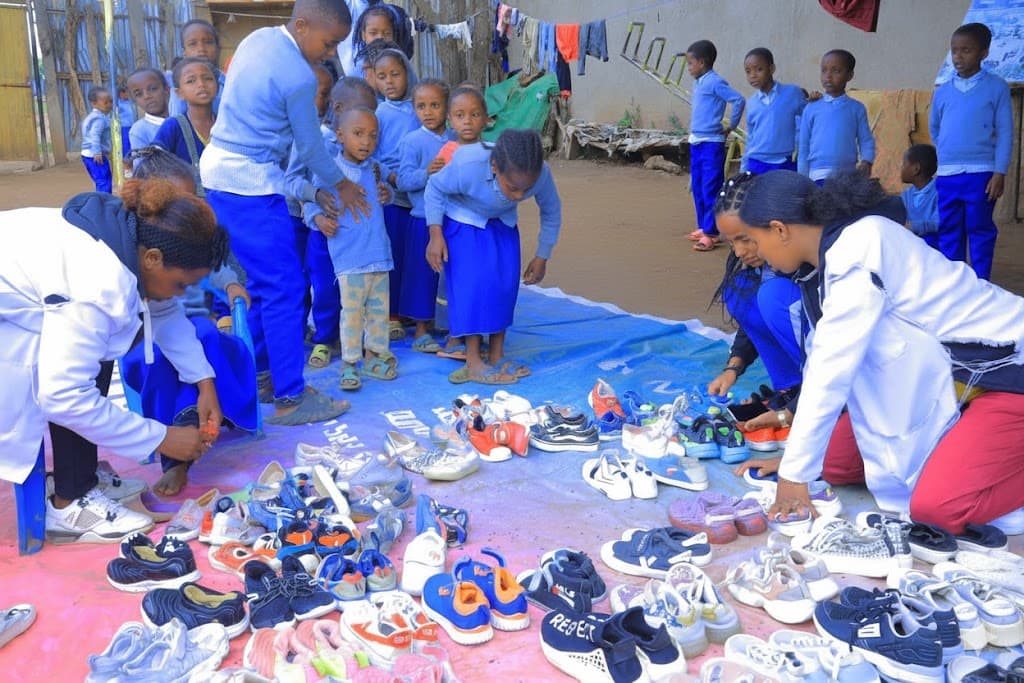 Children receiving clothing
